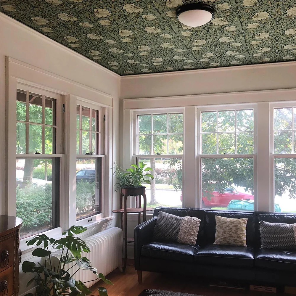 William Morris pimpernel wallpaper on a ceiling in a sunroom.