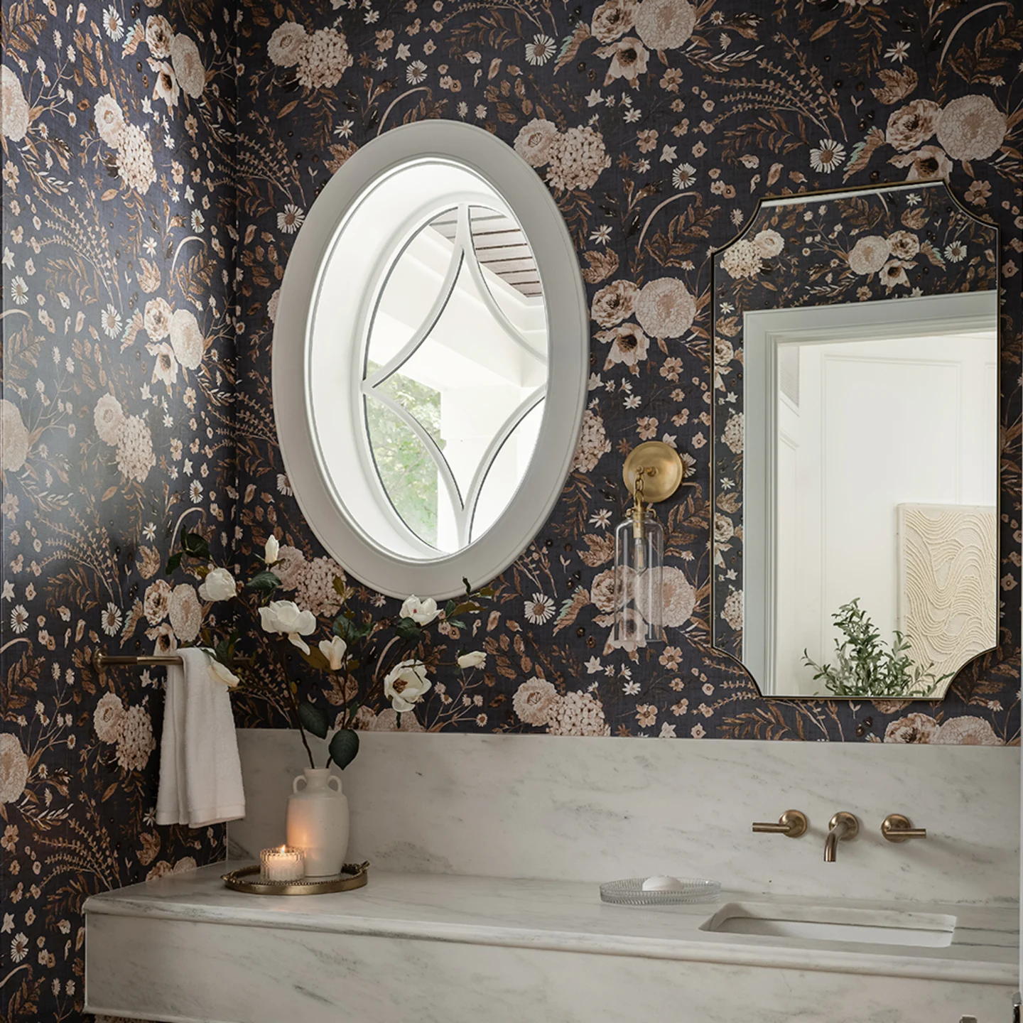 Bathroom or powder room with grey floral wallpaper.