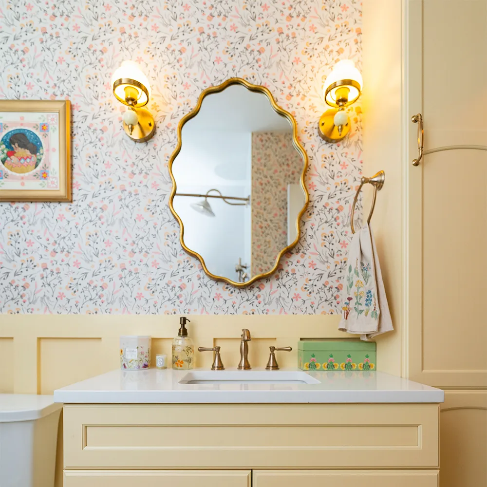 Bathroom with Clover Country Floral Spoonflower wallpaper.