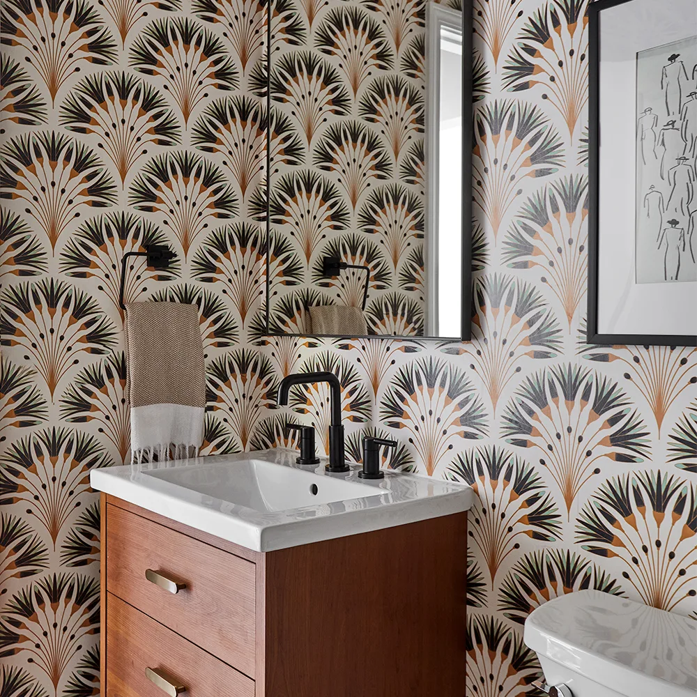 Bathroom with Art Deco floral wallpaper.