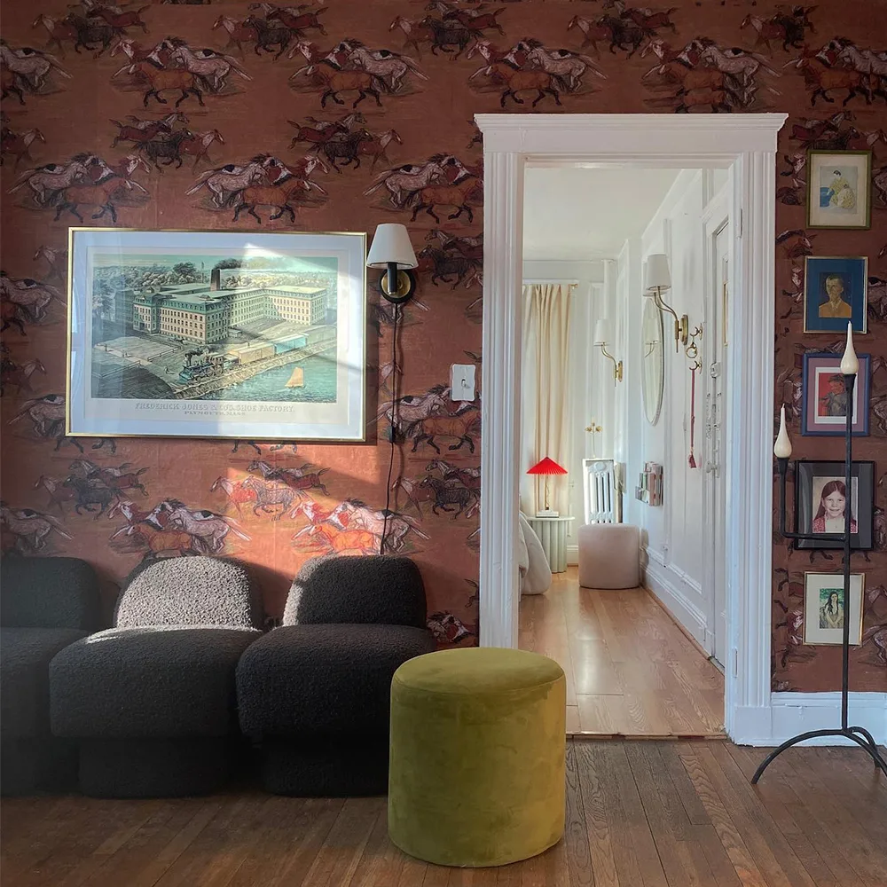 Wild horses wallpaper in a living space.