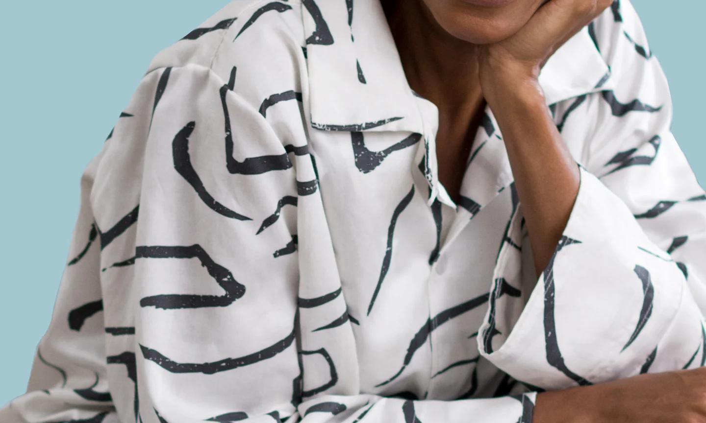 Woman wearing black and white pjs.