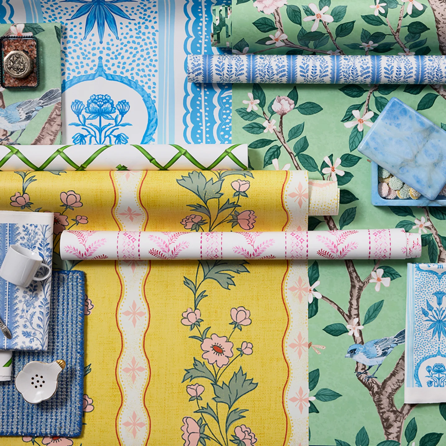 Rolls of southern maximalist style wallpaper.