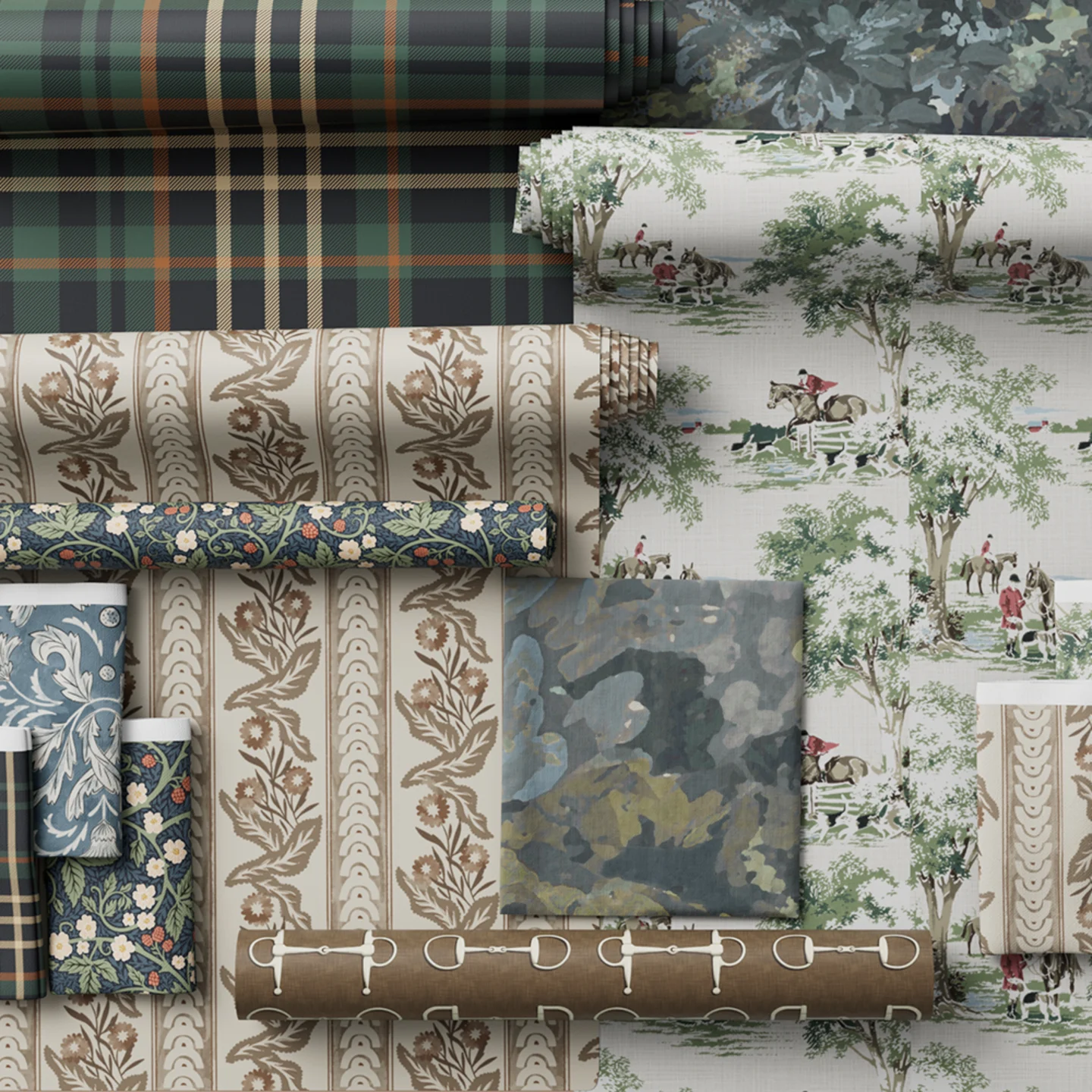 Wallpaper rolls and fabrics from the traditional collection styled together.