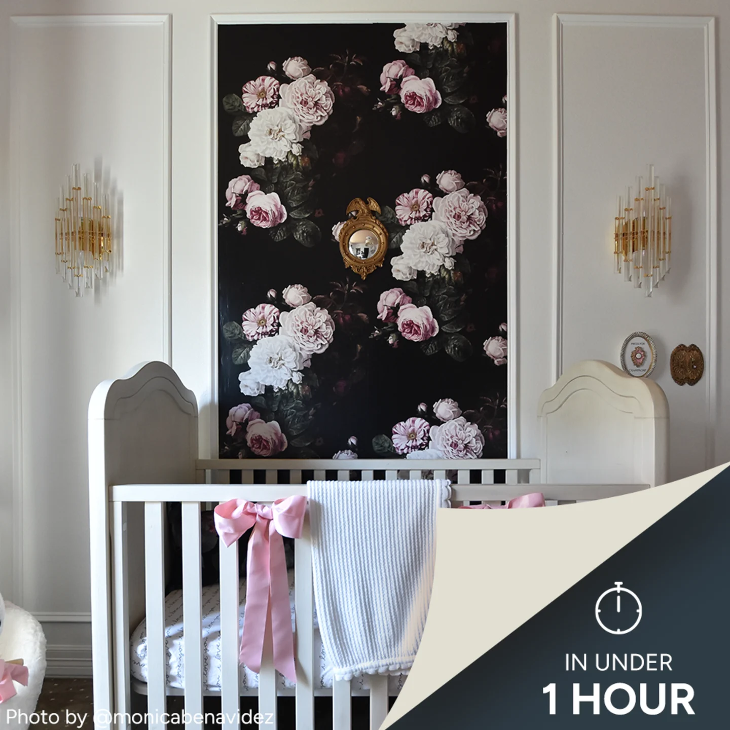 Nursery with bold floral wallpaper panel